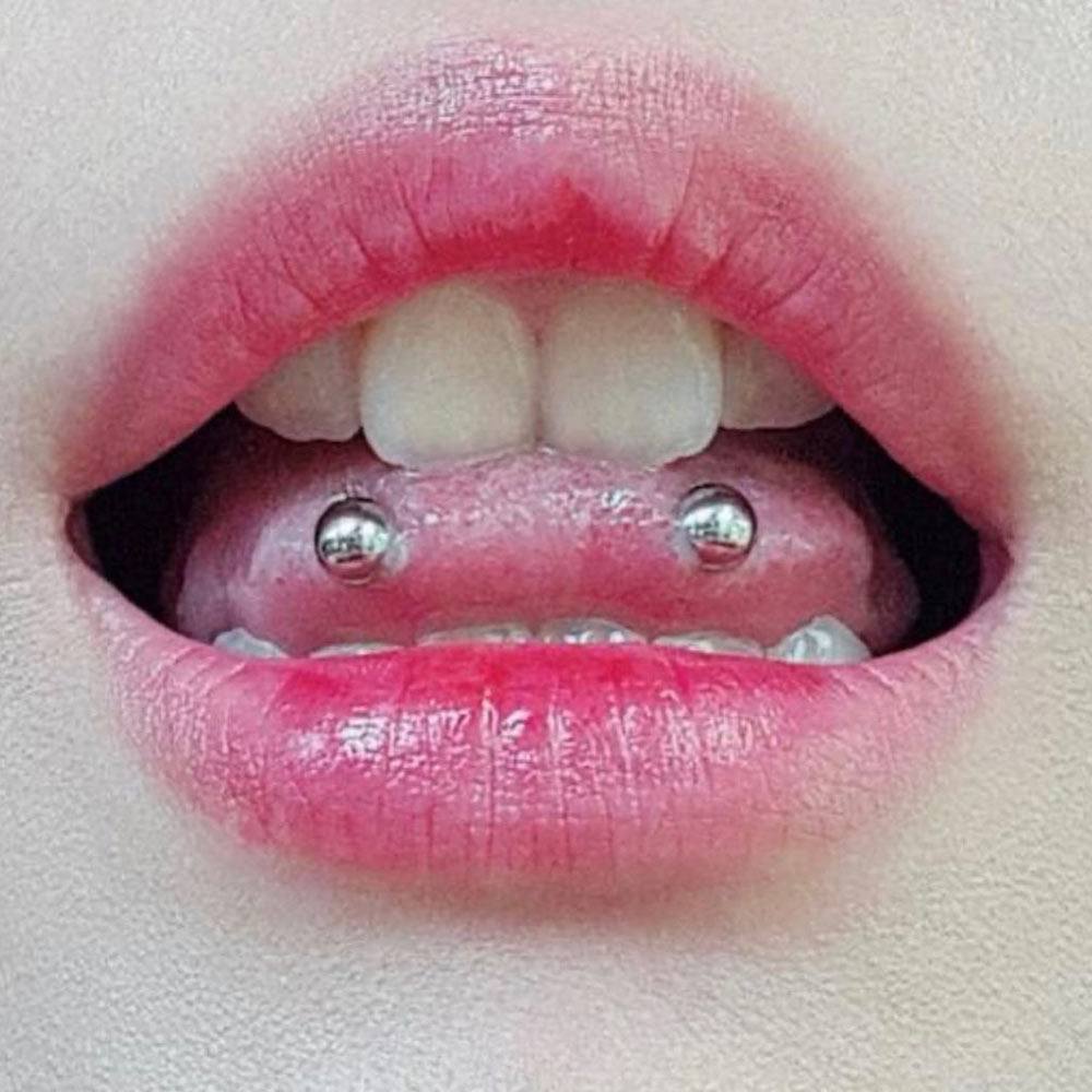 Changing snake eyes tongue shop piercing