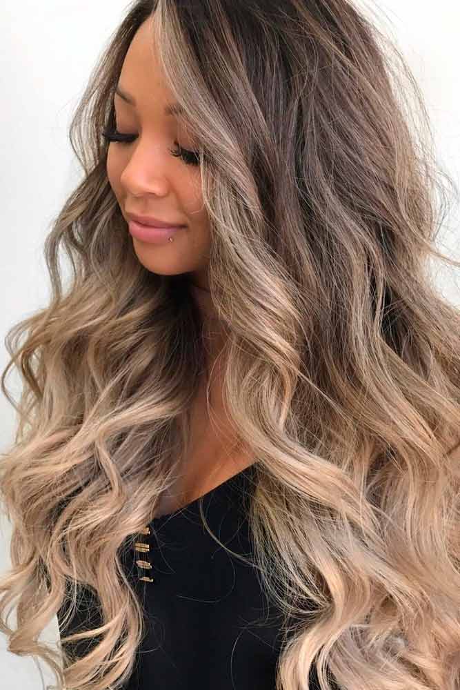 Layered Wavy Locks With Highlights #curlyhairstyles #ombrehairstyles