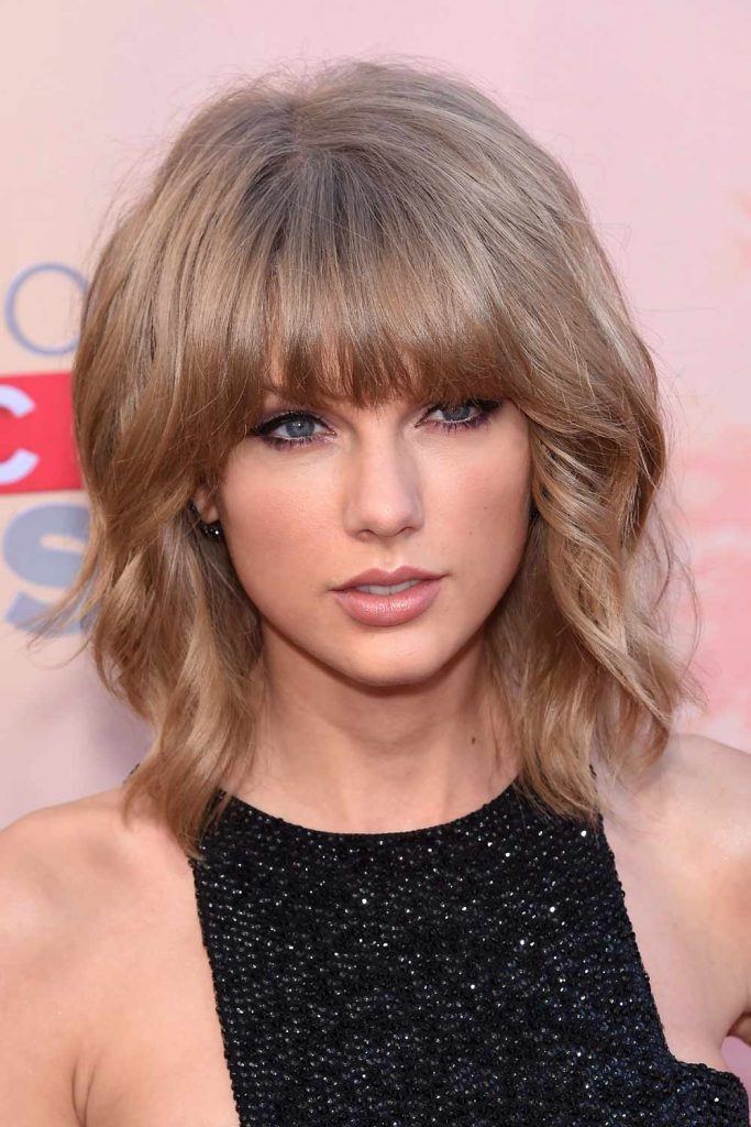 Taylor Swift with Layered Bob and Blunt Bangs
