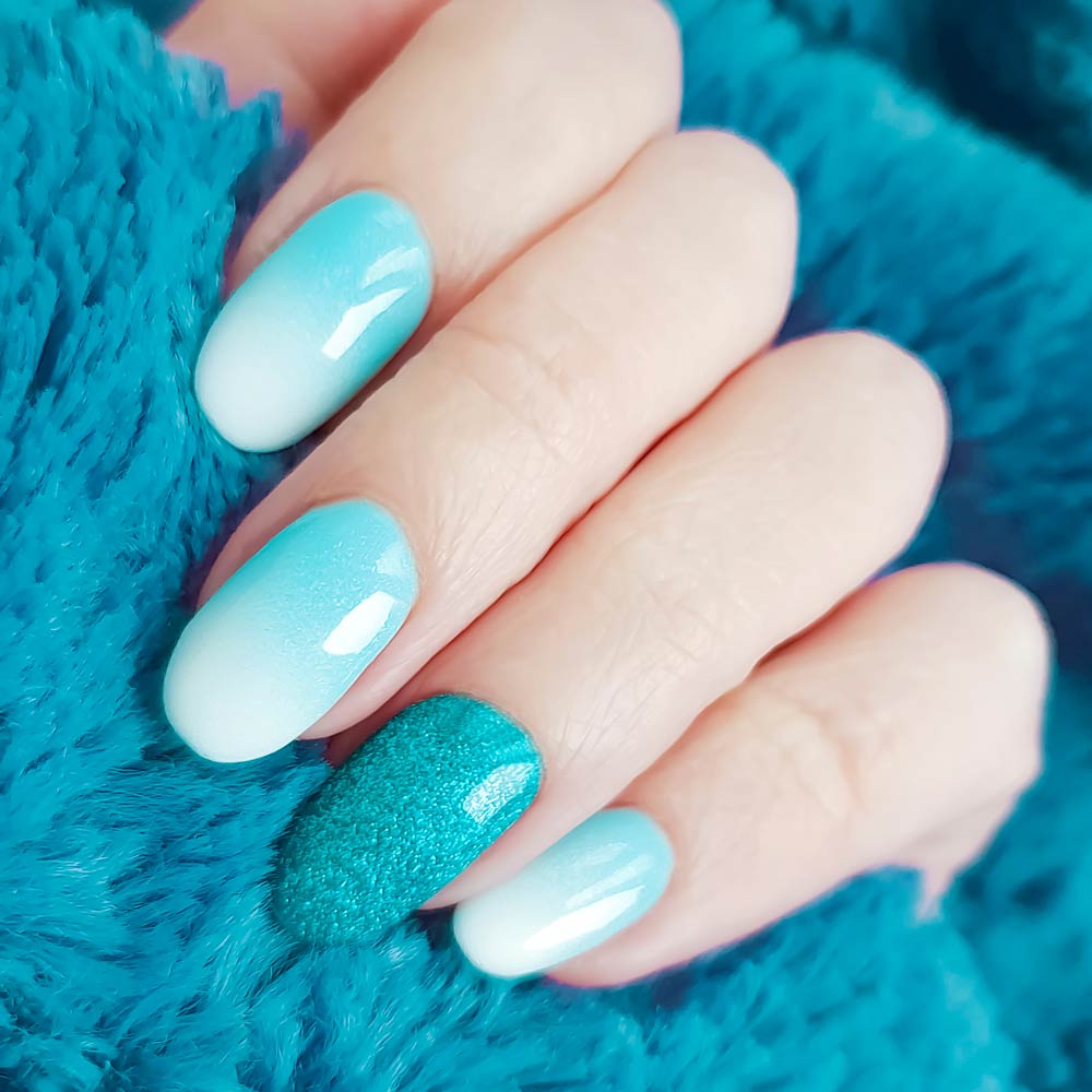 Blue And White Ombre Nails with Glitter Accent