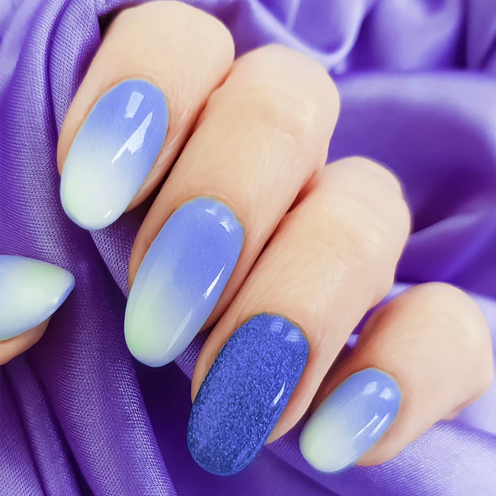 White and Blue Ombre Nails with Accent Nail