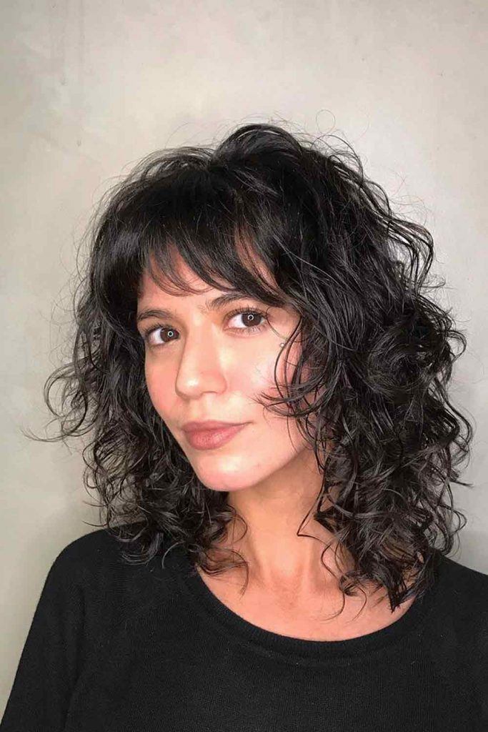 Curly Shag Hair With Straight Bangs #curlyhairstyle #prettyhaircuts