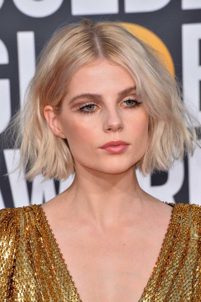 Lucy Boynton With Blonde Messy Bob