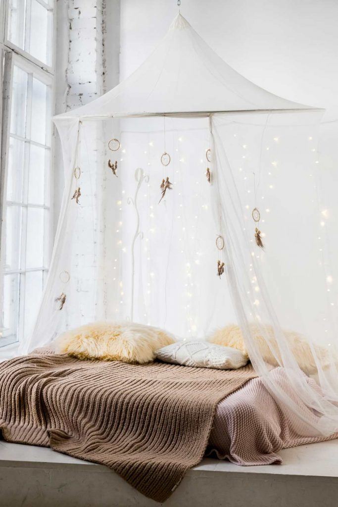 Canopy Bed with String Lights Decoration