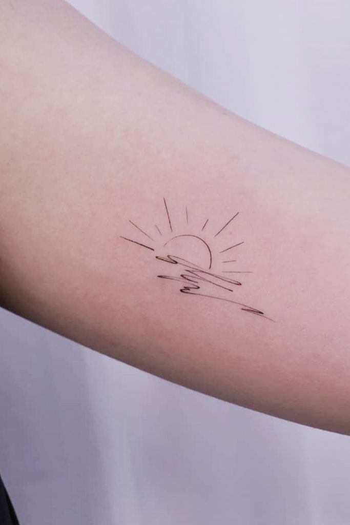 Minimalist Sun Tattoo