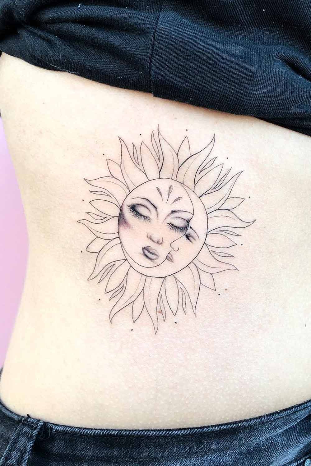 sun rays on shoulder tattoo