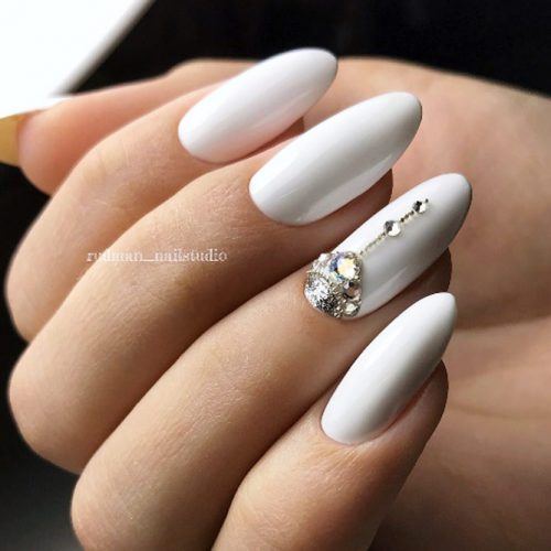 Glamorous White Nails Design With A Half Moon Accent #halfmoonaccent
