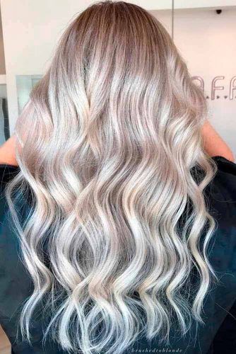 Glossy Ash Blonde Hair With Bright Highlights