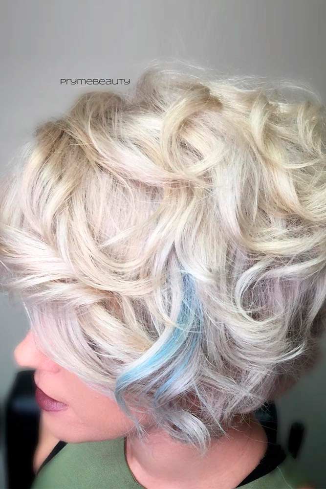 Feminine Curls With Blue Accent #blondehair #curlyhairstyles