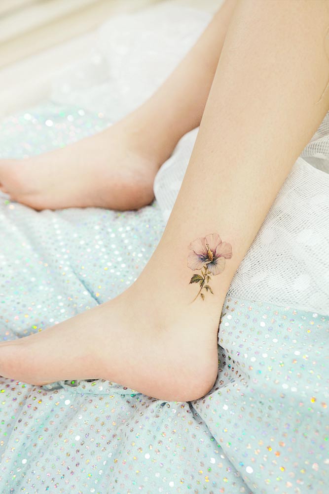 Minimalist Flower Tattoo Design #flowertattoo #legtattoo
