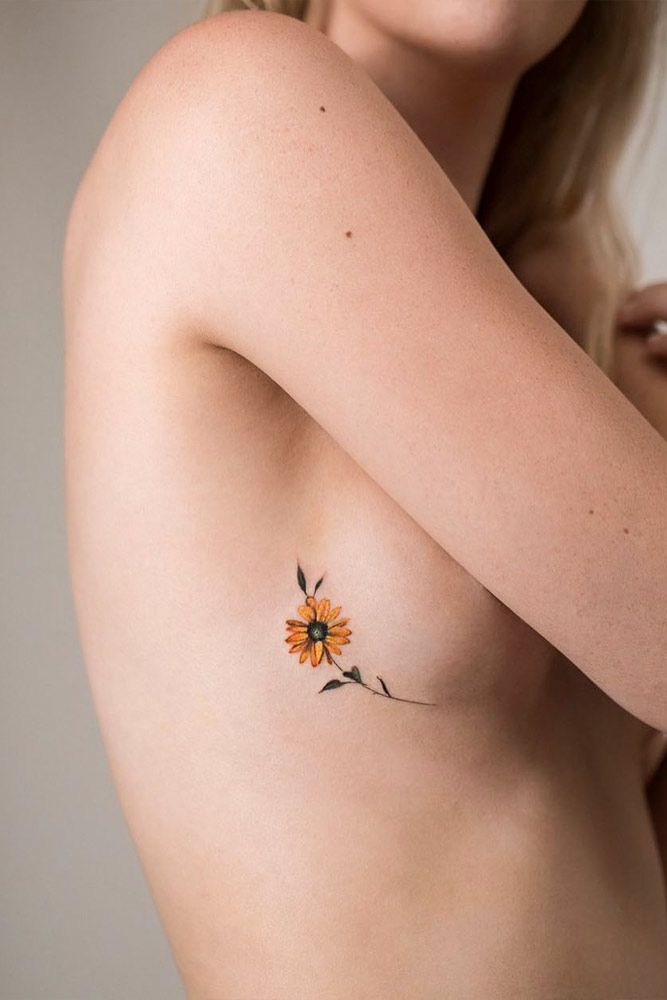 Minimalist Flower Tattoo Design For Your Side Body #sidebodytattoo #flowertattoo