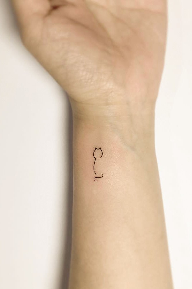 Small Minimalist Tattoo Design For Wrist #wristtattoo #cattattoo