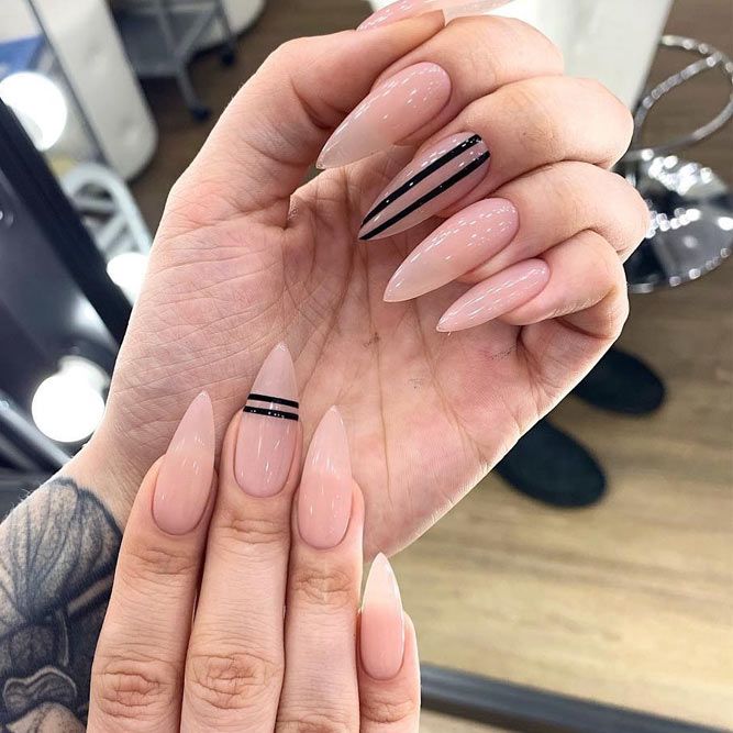 Long Nude Stiletto Shaped Nails #stilettonails #longnails #blackstripes