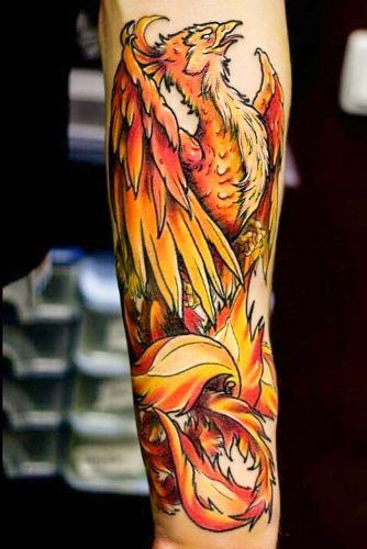 Fire Colored Phoenix Bird Tattoo #armtattoo