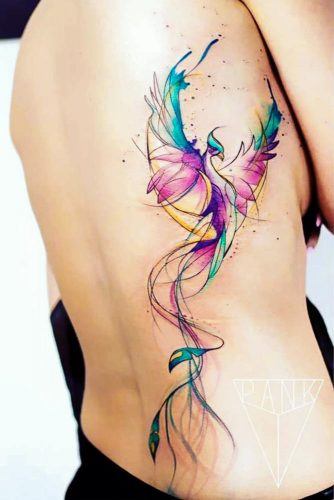 Watercolor Phoenix Tattoo On The Side #sidetattoo #watercolortattoo #watercolorphoenixtattoo