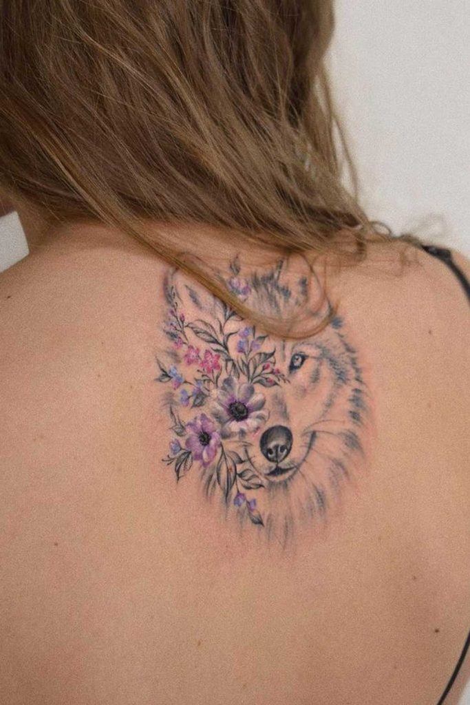 girl with wolf head tattoo meaning