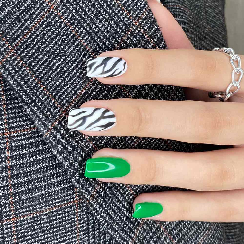 Zebra Print Nail Art with Green Nails