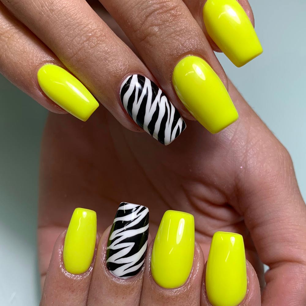 Yellow Nails with Accented Zebra Print Nails