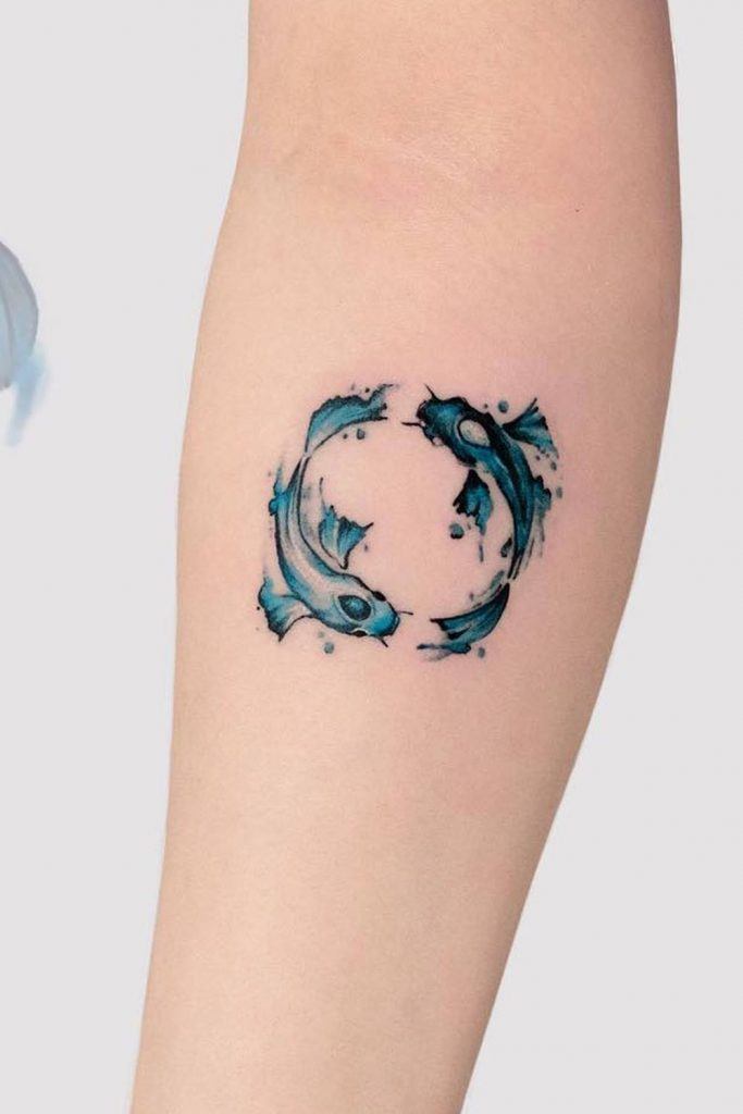 koi fish tattoo forearm blue