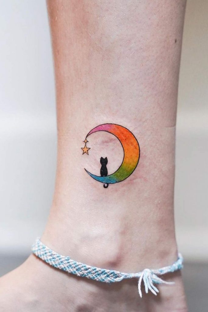 A Cat with Moon Small Leg Tattoo