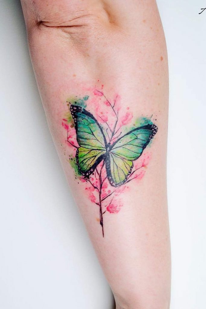 Pink and green butterfly tattoos