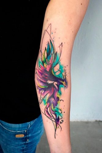 delicate phoenix tattoo