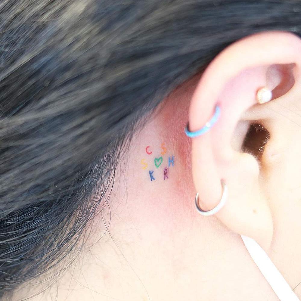 Simple Behind the Ear Colorful Tattoo
