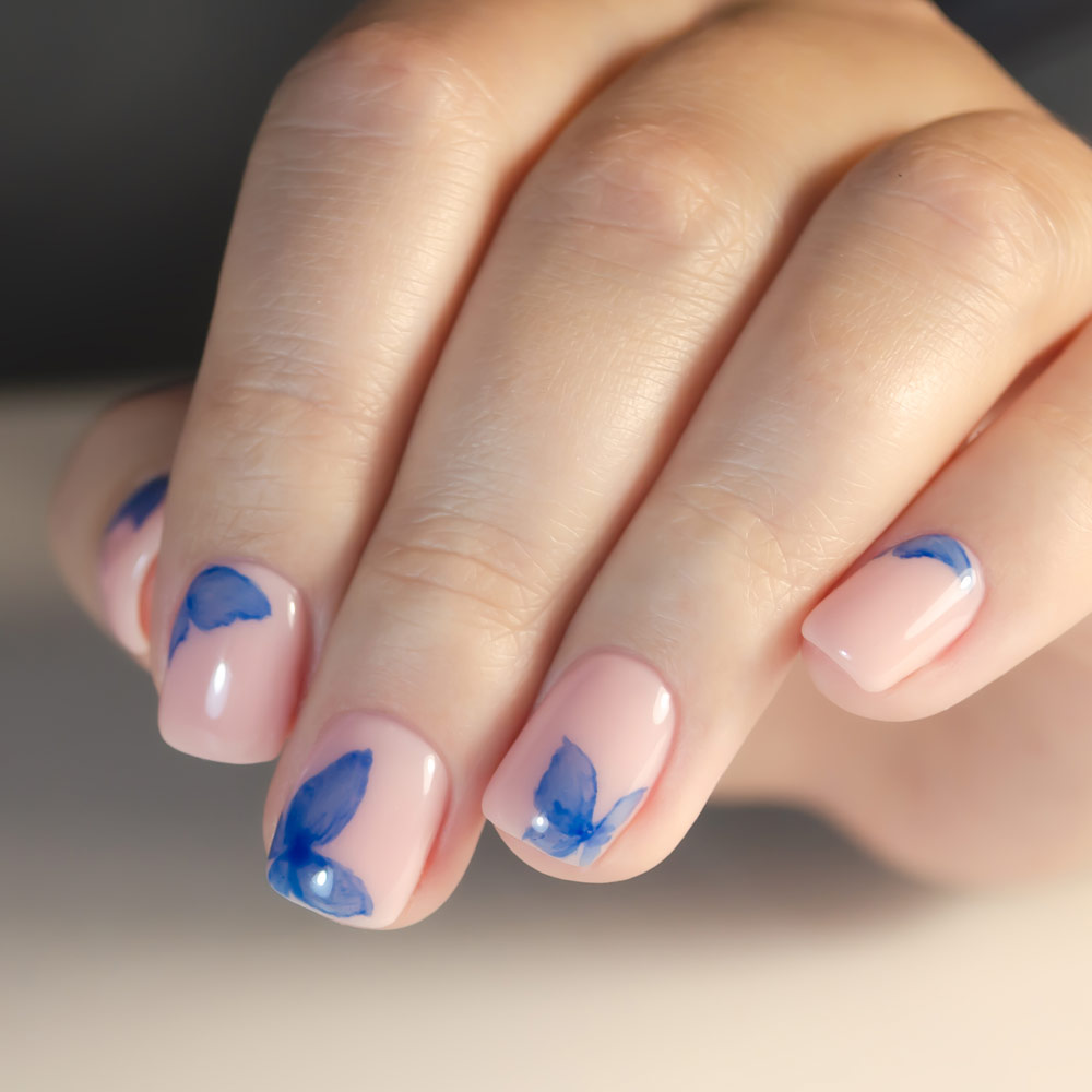 Nude Nails with Blue Butterflies