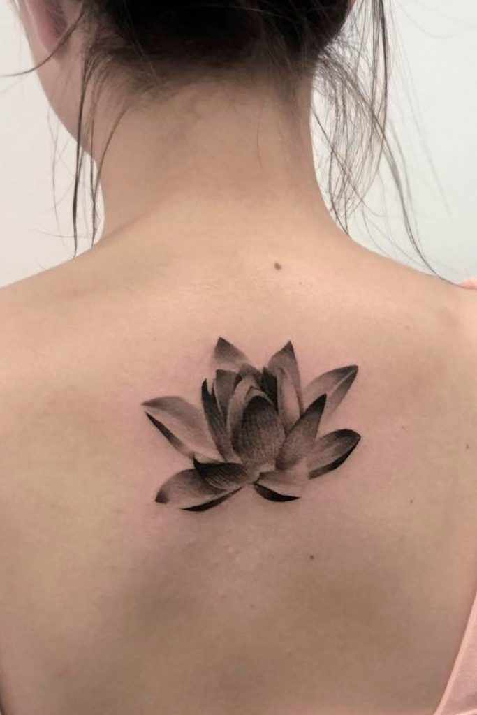 Lotus Flower And Butterflies Tattoo On Lower Back