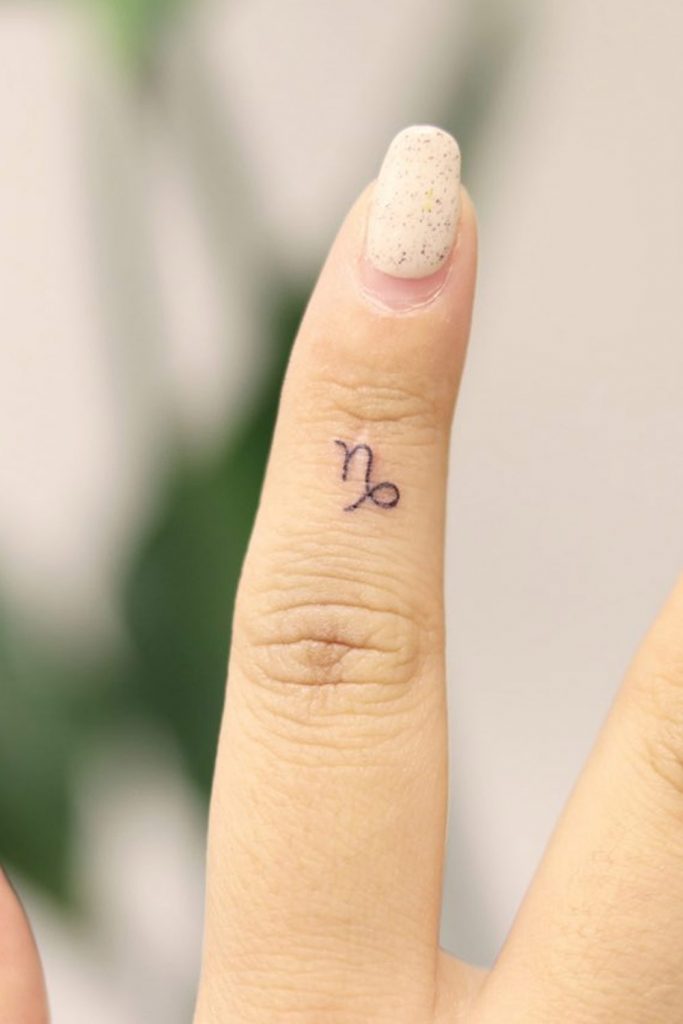 capricorn symbol tattoo for women