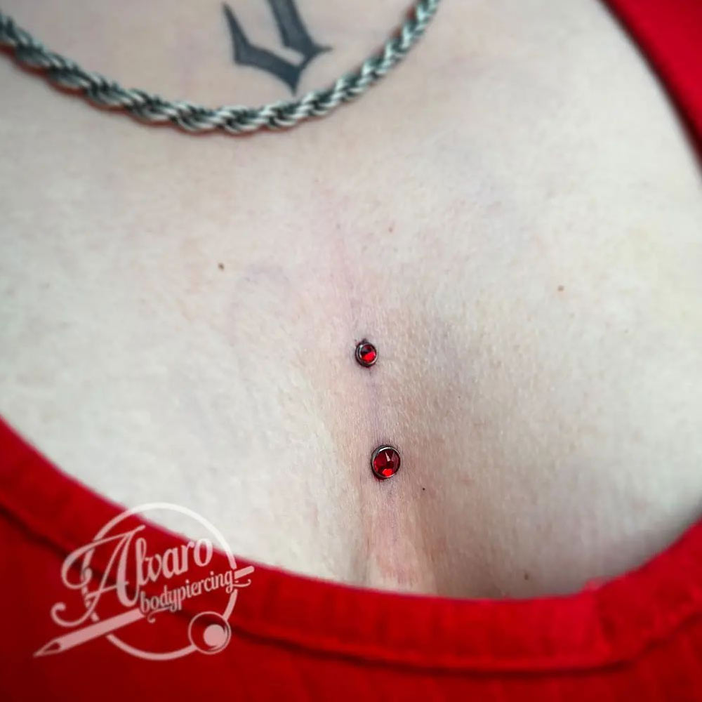 29 Tattoo Design Ideas With Dermal Piercings To Add Glam To Your Ink   YourTango