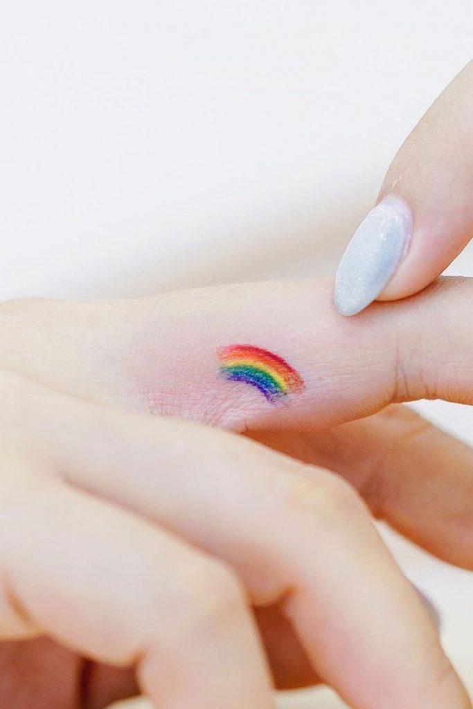 Small Rainbow Finger Tattoo