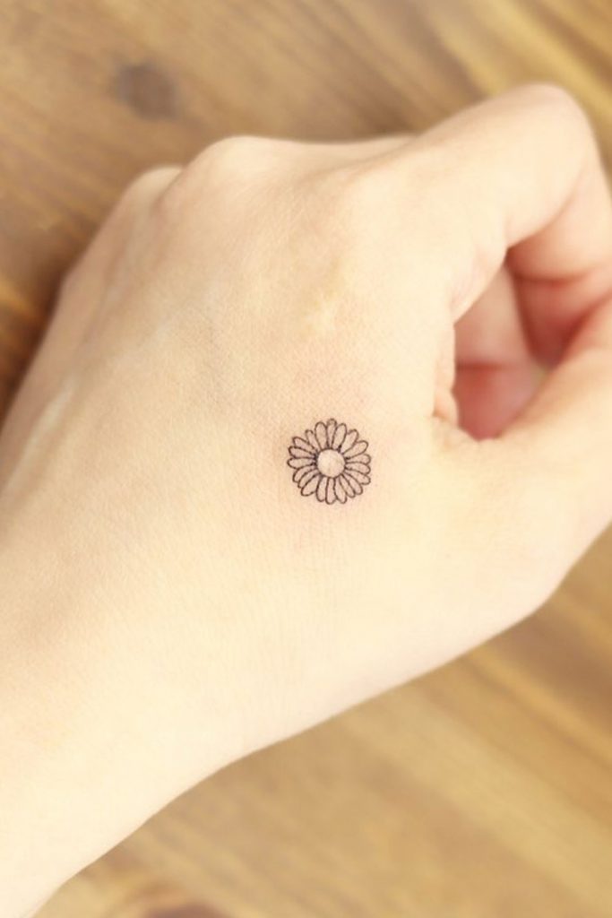 Small Hand Flower Tattoo Design