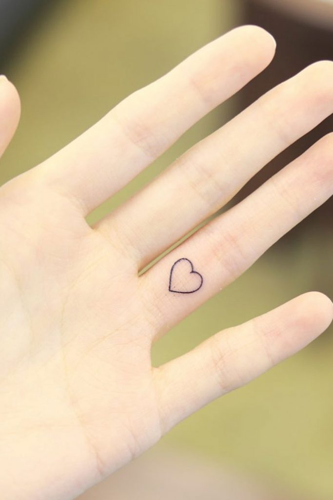 Tiny Heart Tattoo on Finger