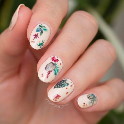 Fall Nail Design With A Leaves and Flowers Pattern
