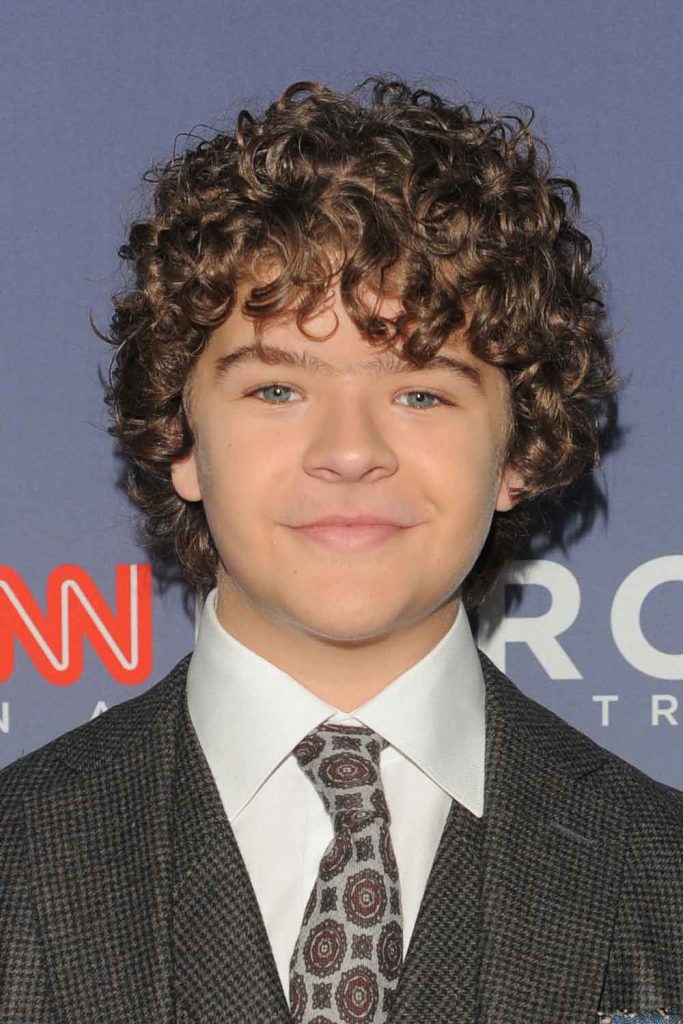 Gaten Matarazzo with Messy Long Curly Cut