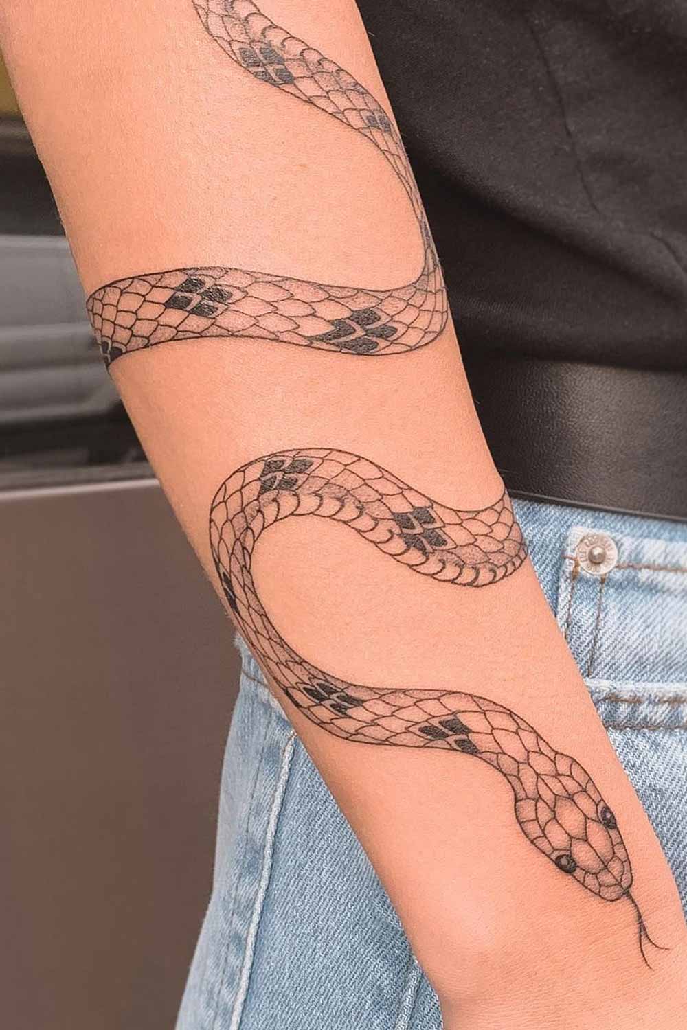 47 Gorgeous Snake Tattoos for Women with Meaning