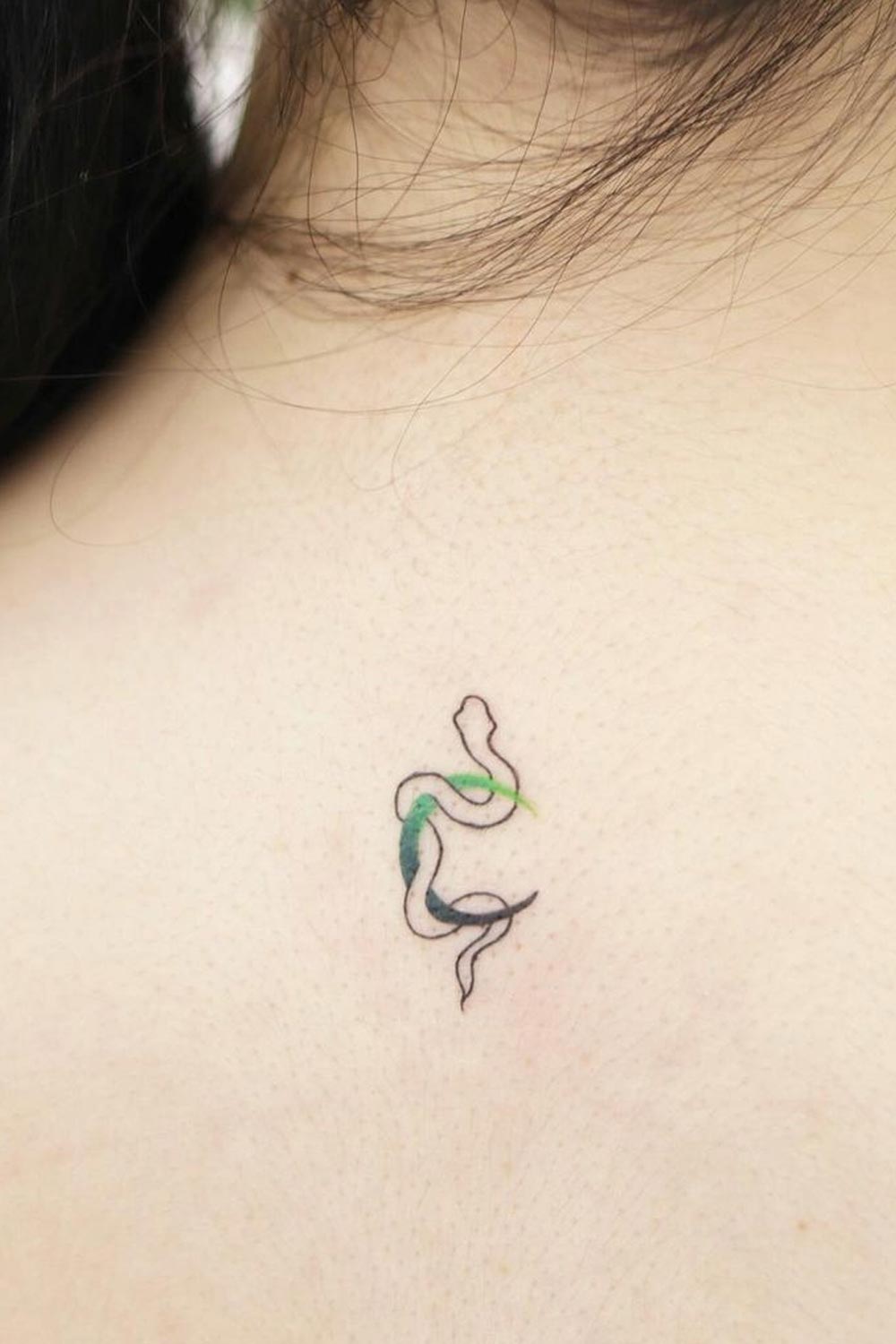 small snake tattooTikTok Search