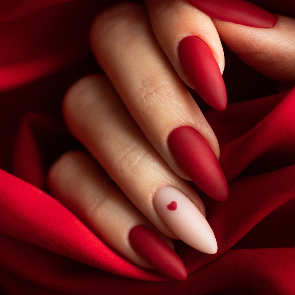 Matte Red Nails with Accent Nude Nail