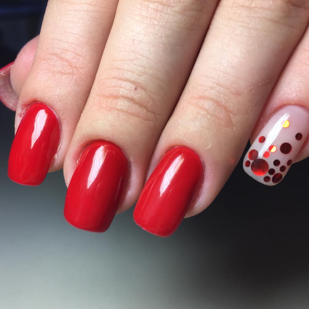 Red Nails with Accent Glitter Nail