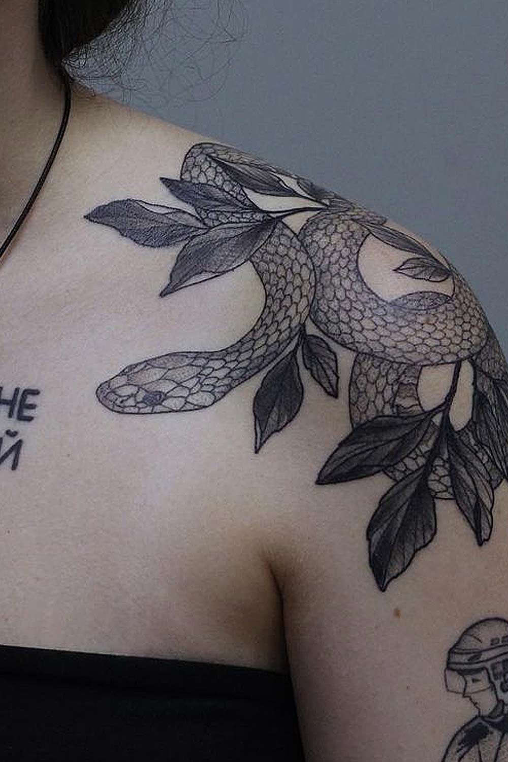 Shoulder Tattoo with Snake and Leaves