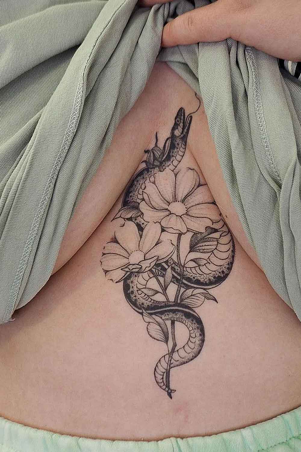 Sternum Snake Tattoo Idea