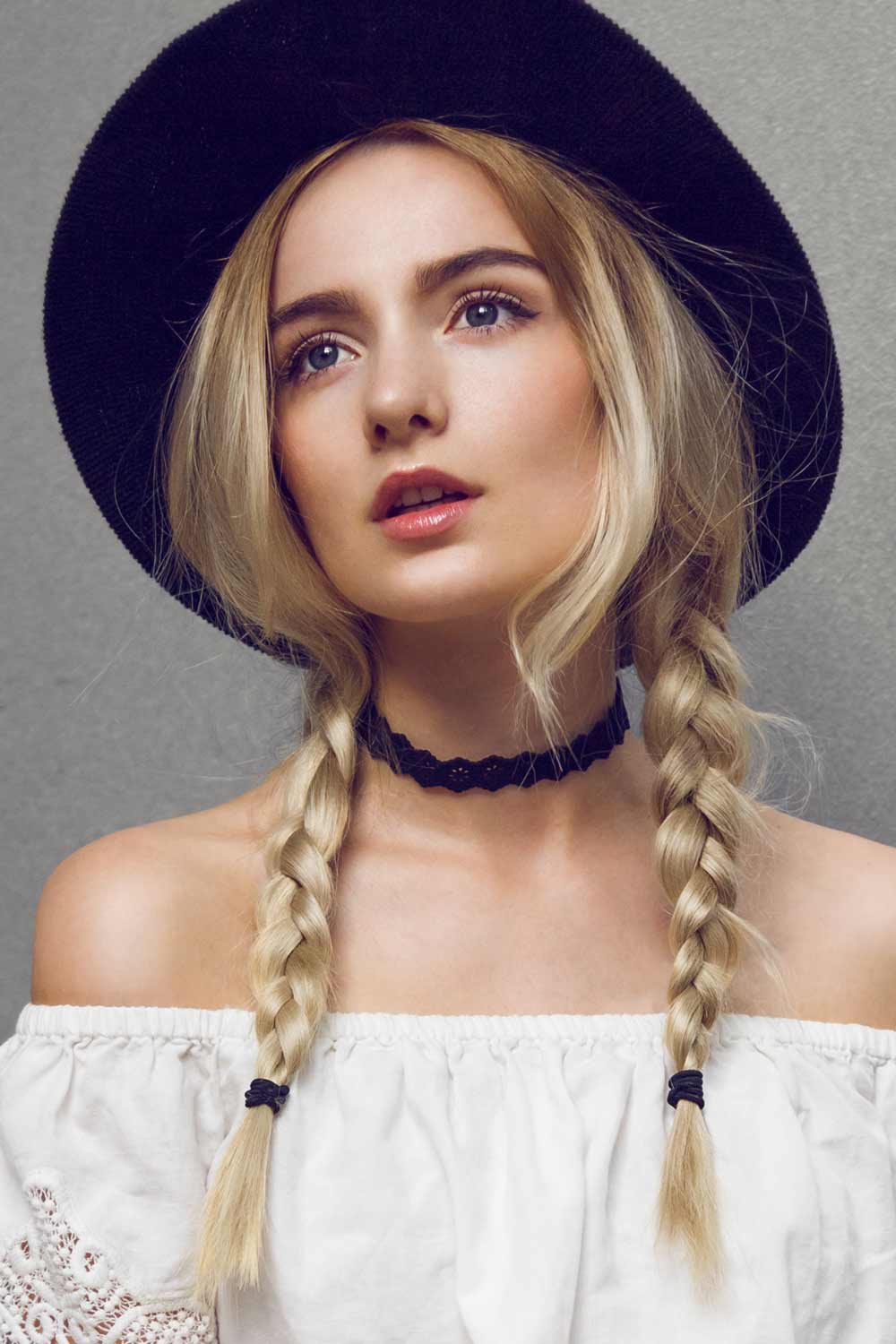 Side Braids with a Hat Hairstyle