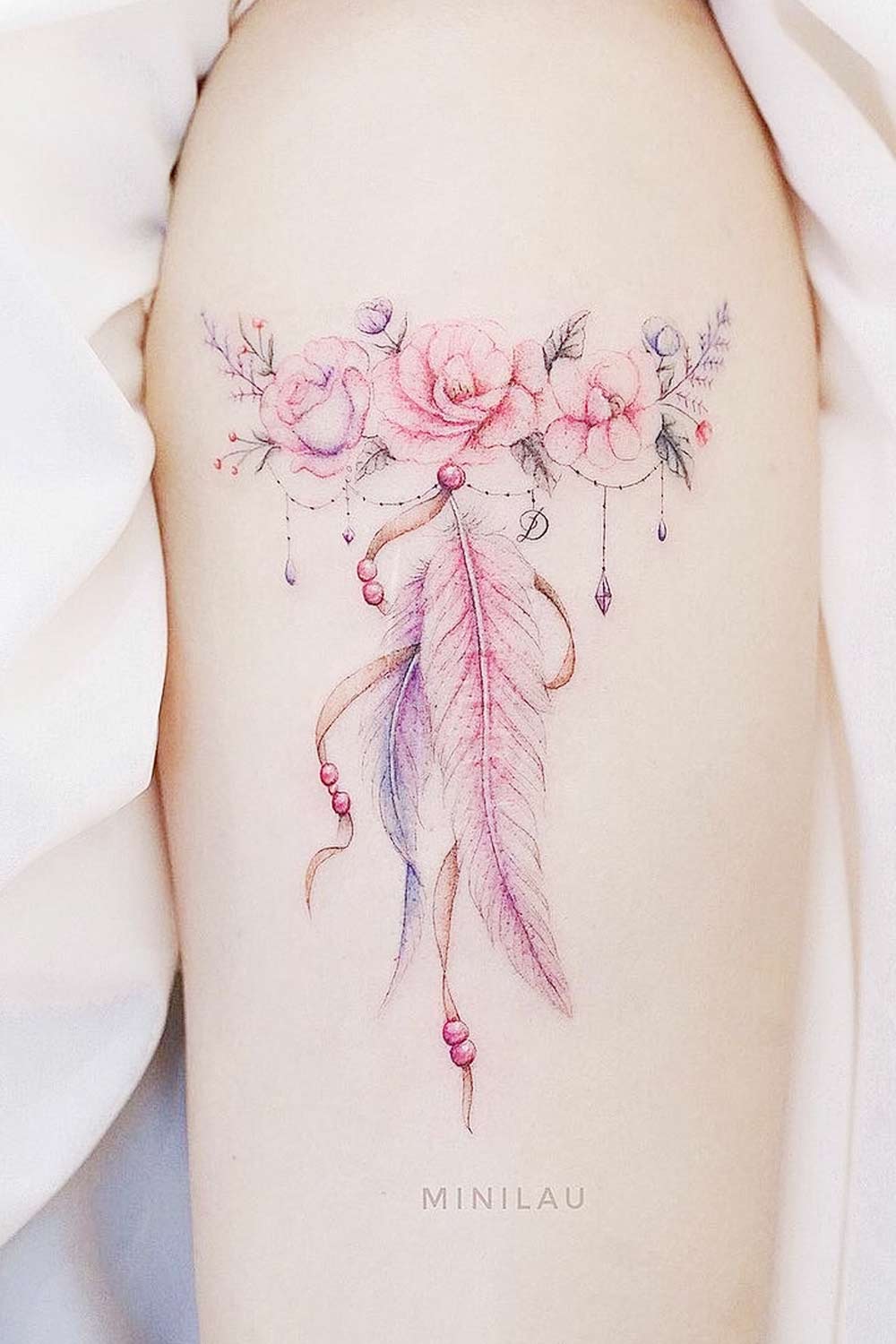 Floral Tattoo with Feathers