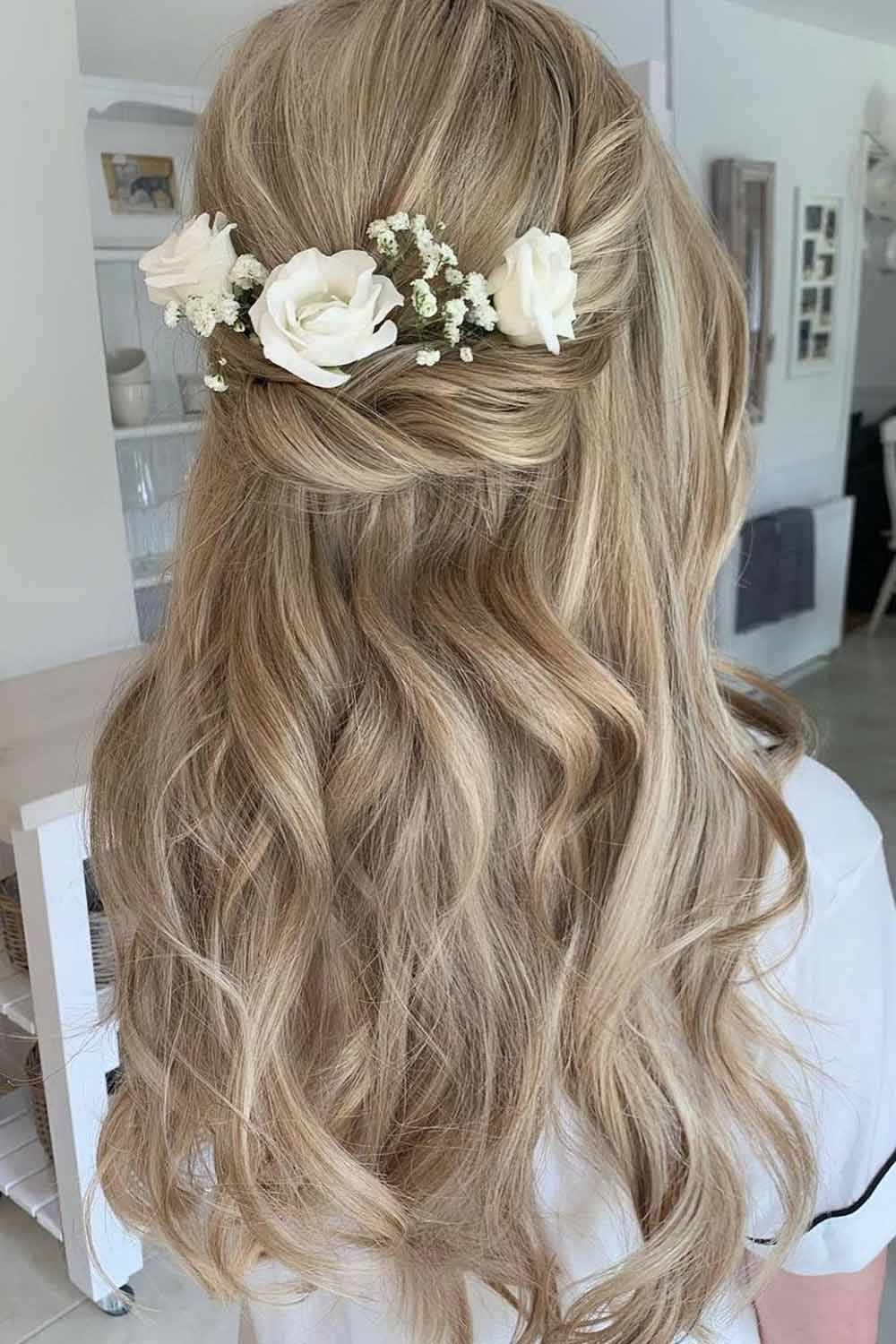 Wavy Half Up with Floral Accessory