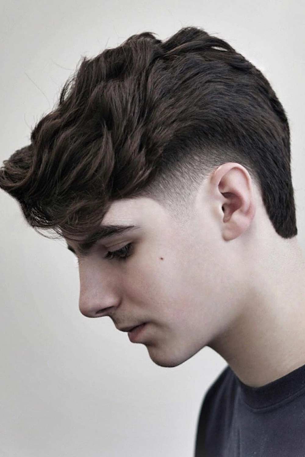 Burst Fade Curly Hairstyle for Men