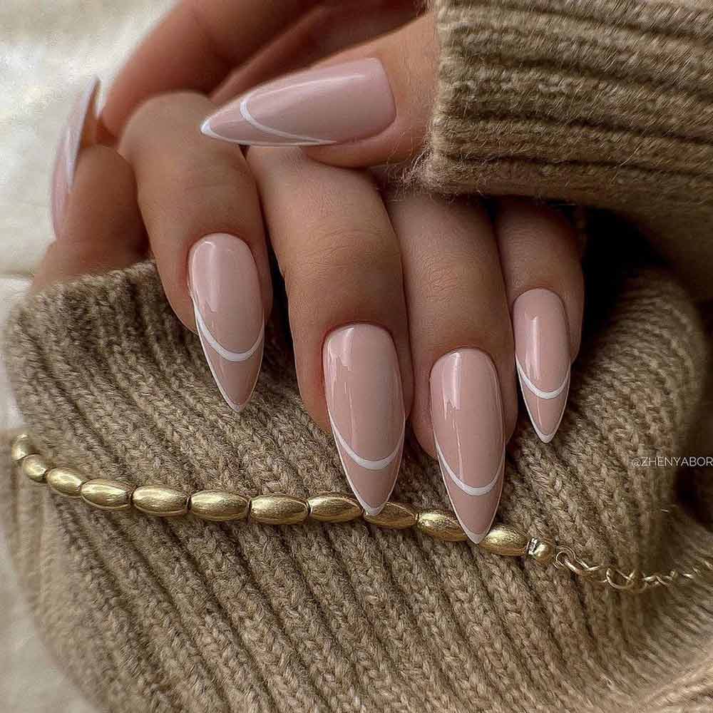 Nude Stiletto Nails with French Design