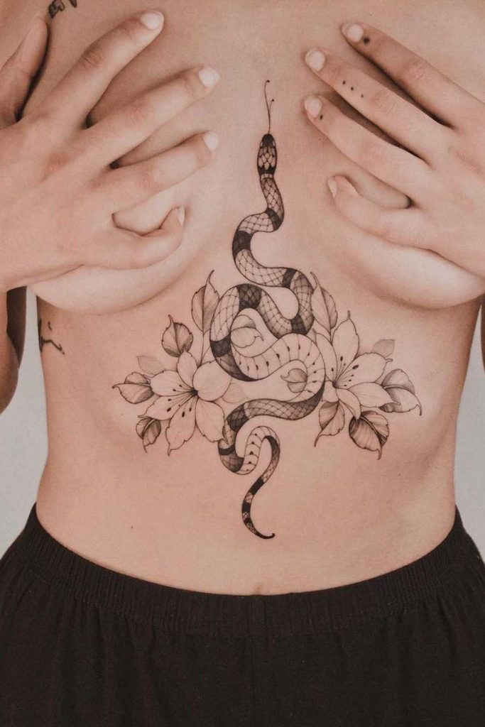 Big Sternum Tattoo with Snake and Flowers