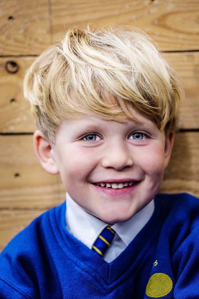 boys haircuts voluminous textured bangs