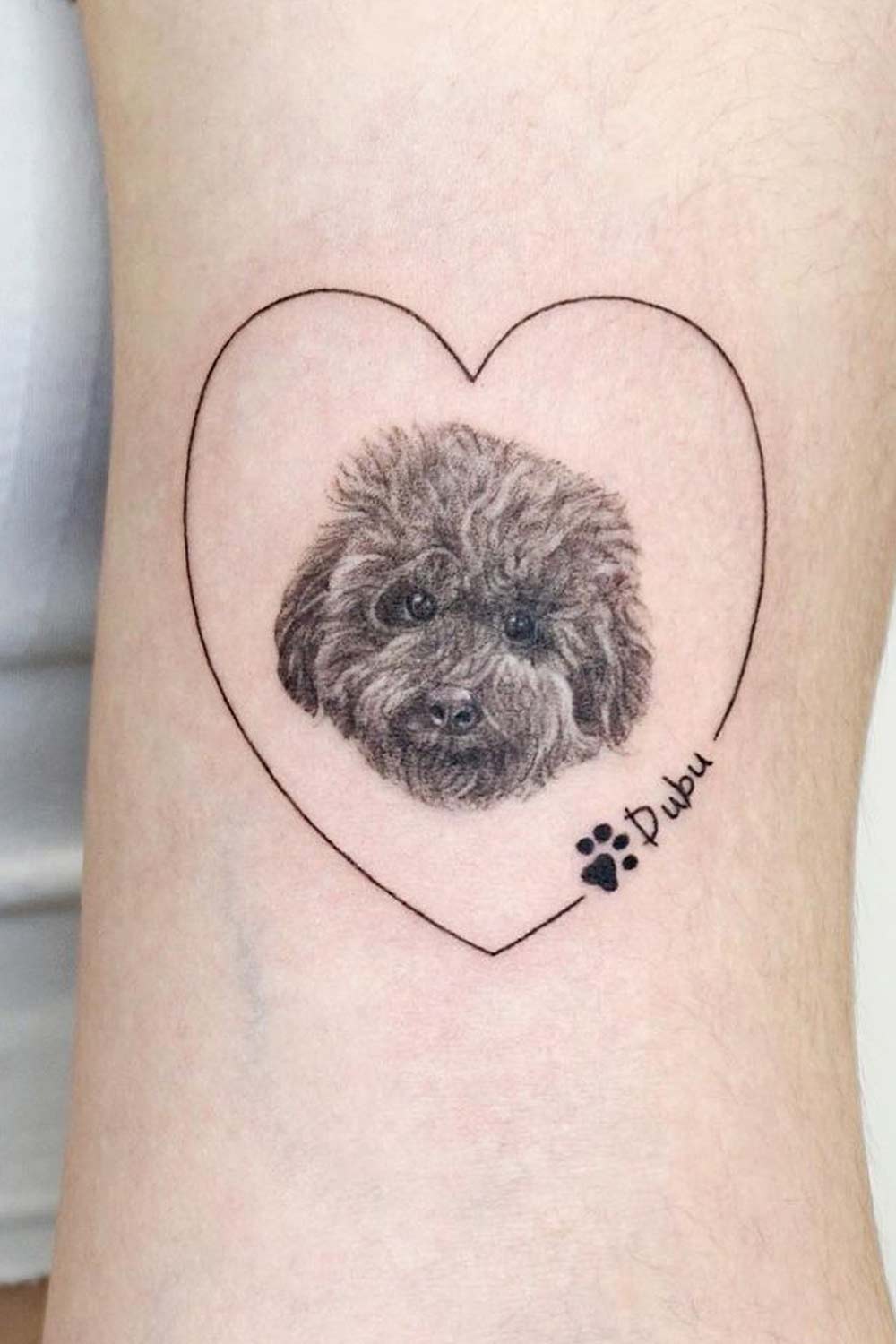Lovely Dog with Heart Tattoo